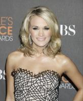 49558_celebrity-paradise.com-The_Elder-Carrie_Underwood_2010-01-06_-_36th_annual_People8s_Choice_Awards_862_122_398lo.jpg