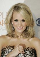 49884_celebrity-paradise.com-The_Elder-Carrie_Underwood_2010-01-06_-_36th_annual_People7s_Choice_Awards_6221_122_569lo.jpg