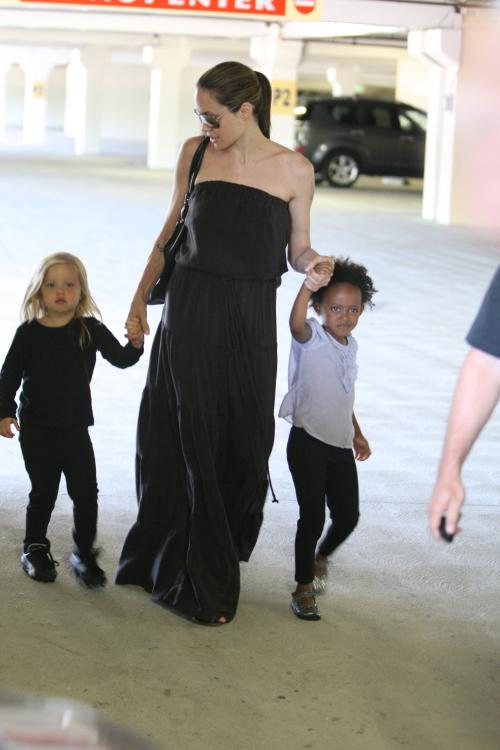20671_Celebutopia-Angelina_Jolie_taking_daughters_to_a_kid_center_in_a_mall_in_LA-08_122_161lo.JPG