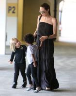 20725_Celebutopia-Angelina_Jolie_taking_daughters_to_a_kid_center_in_a_mall_in_LA-14_122_504lo.JPG