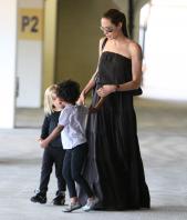 24010_Celebutopia-Angelina_Jolie_taking_daughters_to_a_kid_center_in_a_mall_in_LA-13_122_247lo.JPG