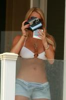 Lindsay Lohan with Polaroid