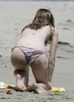 Mischa Barton showing ass covered with sand