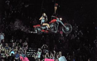Miley Cyrus on a flying motorbike