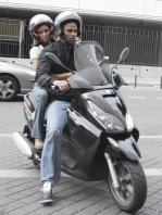 69816_Celebutopia-Eva_Longoria_and_Tony_Parker_riding_scooters_in_Paris-14_122_217lo.JPG