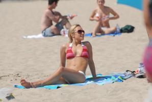 Hayden Panettiere in red bikini on the beach