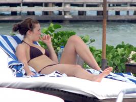 Mandy Moore sunbathing in bikini