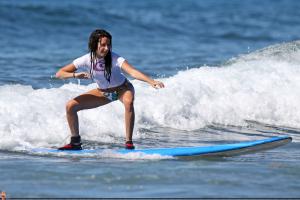 45429_ashley_tisdale_surfing_in_hawaii_on_december_31_2010_dfrDUzd_122_558lo.jpg