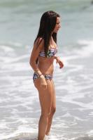 662592982_UploadedByKurupt_Ashley_Tisdale_At_The_Beach_in_Malibu_July02_2011_14_122_569lo.jpg