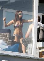 753747954_UploadedByKurupt_Ashley_Tisdale_At_The_Beach_in_Malibu_July02_2011_adds_01_122_258lo.jpg