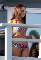 753861668_UploadedByKurupt_Ashley_Tisdale_At_The_Beach_in_Malibu_July02_2011_adds_08_122_100lo.jpg