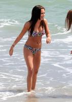 754041249_UploadedByKurupt_Ashley_Tisdale_At_The_Beach_in_Malibu_July02_2011_adds_21_122_516lo.jpg