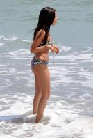 754062644_UploadedByKurupt_Ashley_Tisdale_At_The_Beach_in_Malibu_July02_2011_adds_23_122_138lo.jpg