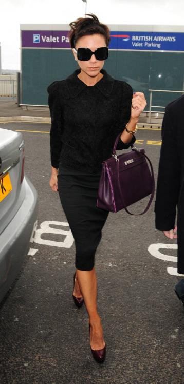 69243_Celebutopia-Victoria_Beckham_at_Heathrow_Airport-01_122_44lo.jpg