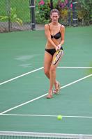 Jennifer Love Hewitt playing tennis