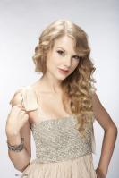 Taylor Swift in gold dress