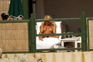 Victoria Silvstedt sunbathing topless