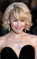 39412_Celebutopia-Kylie_Minogue-Brit_Awards_2008_Arrivals-26_122_390lo.jpg