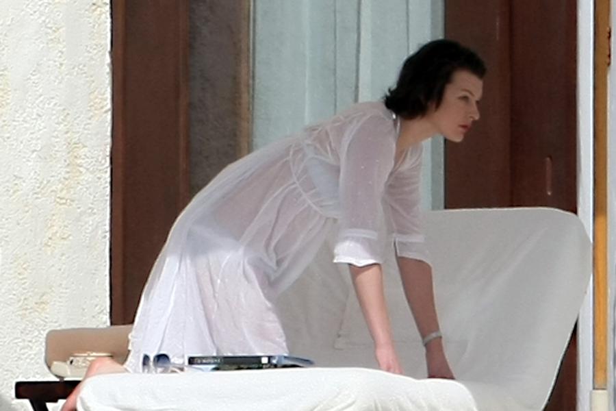 87737_233651d1263571764_milla_jovovich_white_see_thru_dress_white_bikini_beach_los_cabos_1_5_10_mj_6__122_531lo.jpg