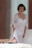 87745_233652d1263571764_milla_jovovich_white_see_thru_dress_white_bikini_beach_los_cabos_1_5_10_mj_7__122_428lo.jpg