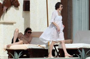 87768_233654d1263571764_milla_jovovich_white_see_thru_dress_white_bikini_beach_los_cabos_1_5_10_mj_9__122_197lo.jpg