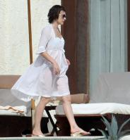 87776_233655d1263571764_milla_jovovich_white_see_thru_dress_white_bikini_beach_los_cabos_1_5_10_mj_10__122_442lo.jpg