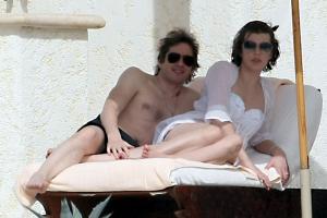 87800_233657d1263571795_milla_jovovich_white_see_thru_dress_white_bikini_beach_los_cabos_1_5_10_mj_12__122_421lo.jpg