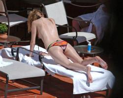 Mischa Barton sunbathing topless