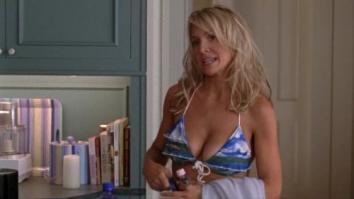 Barbara Alyn Woods in bikini going to the pool