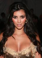 23529_KimKardashianJessicaSimpsonswimwearfashionshow09_122_701lo.jpg