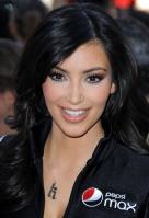 DNJ6SC24UP_KimKardashian-BullrunRally-071109-10.jpg