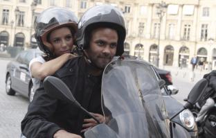 69763_Celebutopia-Eva_Longoria_and_Tony_Parker_riding_scooters_in_Paris-08_122_576lo.JPG