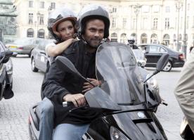 70141_Celebutopia-Eva_Longoria_and_Tony_Parker_riding_scooters_in_Paris-06_122_152lo.JPG