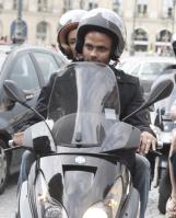 73037_Celebutopia-Eva_Longoria_and_Tony_Parker_riding_scooters_in_Paris-04_122_471lo.JPG