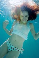 Carla Gugino under water