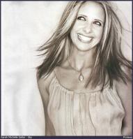 Sarah Michelle Gellar smiling in hot top